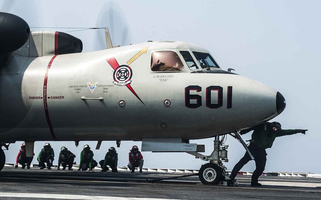 140901-N-MW819-066  ARABIAN GULF (Sept. 1, 2014)  Sailors prepare to launch an E-2C Hawkeye assigned to the Bear Aces of Carrier Airborne Early Warning Squadron (VAW) 124 from the flight deck of the aircraft carrier USS George H.W. Bush (CVN 77). George H.W. Bush is supporting maritime security operations and theater security cooperation efforts in the U.S. 5th Fleet area of responsibility.  (U.S. Navy photo by Mass Communication Specialist 3rd Class Brian Stephens/Released)