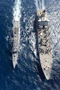 The Oliver Hazard Perry-class guided-missile frigate USS Rodney M. Davis (FFG 60) conducts a replenishment-at-sea with the Military Sealift Command fleet replenishment oiler USNS Tippecanoe (T-AO 199). Rodney M. Davis, stationed in Everett, Wash., is on patrol in the Indian Ocean in support of regional security and stability. (U.S. Navy photo by Mass Communication Specialist 3rd Class Derek A. Harkins/Released)