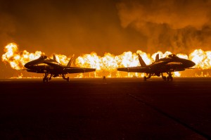 The "Great Wall of Fire" is displayed during the Marine Corps Community Services (MCCS) sponsored 2014 Air Show aboard Marine Corps Air Station (MCAS) Miramar, San Diego, Calif., Oct. 4, 2014. The air show showcases civilian performances and the aerial prowess of the armed forces but also, their appreciation of the civilian community’s support and dedication to the troops. (U.S. Marine Corps photo by Lance Cpl. Trever Statz/Released)