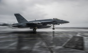 An F/A-18C Hornet assigned to the Valions of Strike Fighter Squadron (VFA) 15 takes off from the flight deck of the aircraft carrier USS George H.W. Bush (CVN 77). George H.W. Bush is supporting maritime security operations, strike operations in Iraq and Syria as directed, and theater security cooperation efforts in the U.S. 5th Fleet area of responsibility. (U.S. Navy photo by Mass Communication Specialist 3rd Class Brian Stephens/Released)