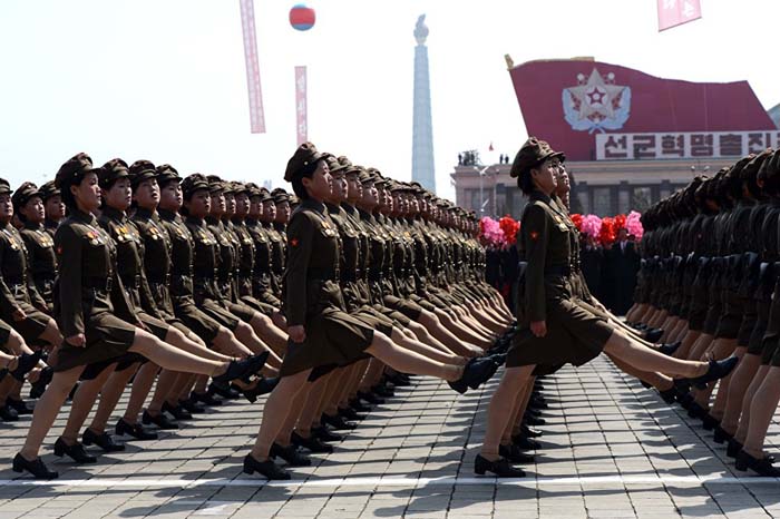 North Korean female soldiers march during a military parade held in Pyongyang on 100th birthday of the country's founder Kim Il-Sung in. April 15, 2012.