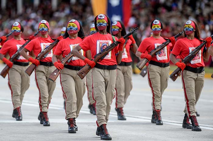 Venezuelan female soldiers participate in a parade during the celebration of Venezuela's Independence Day in Caracas. July 5, 2015.