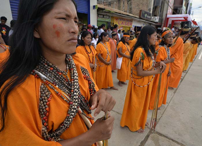 Female Amazonian native members of military-trained self-defense committees against guerrillas and drug traffickers stand in formation during a parade in the town of San Martin de Pagoa, 350 kilometers east from Lima in central Peru. September 19, 2013.