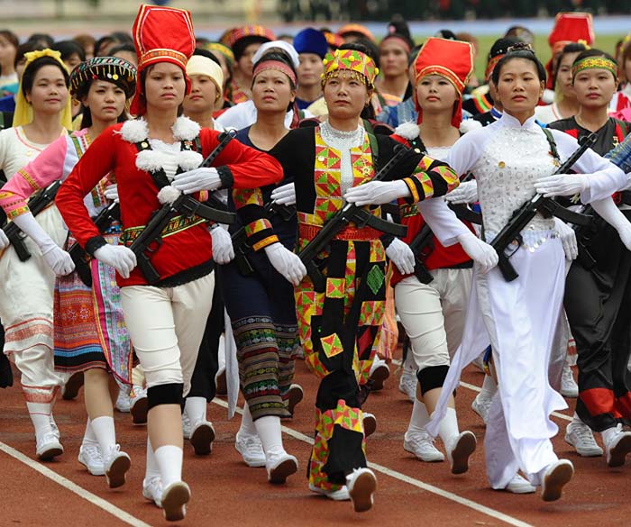 Ethnic minorities female militia parade at Dien Bien Phu during official celebrations of the 60th anniversary of Vietnam's victory over France. May 7, 2014.