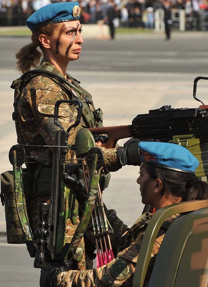 Armenian female soldiers armed with machineguns and crossbows take part in a military parade commemorating the 20th anniversary of the nation independence. September 21, 2011.