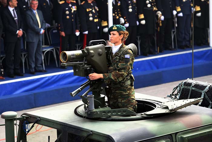 A Greek army female soldier takes part in a military parade in Thessaloniki commemorating Greece's National 'Oxi' (No) Day. October 28, 2013.