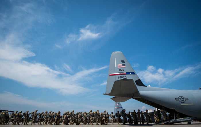  US Army and Italian paratroopers board a US Air Force C-130J Hercules during exercise Swift Response 16, at Ramstein Air Base, Germany.