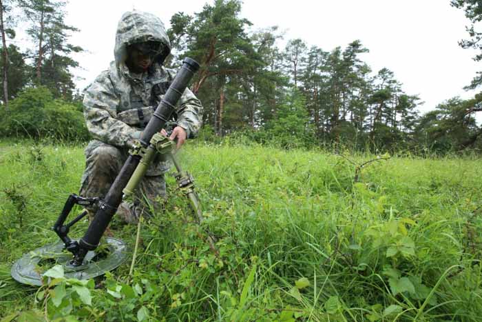 US forces from the legendary 82nd Airborne Division readies a 60mm mortar system for a simulated fire mission. 