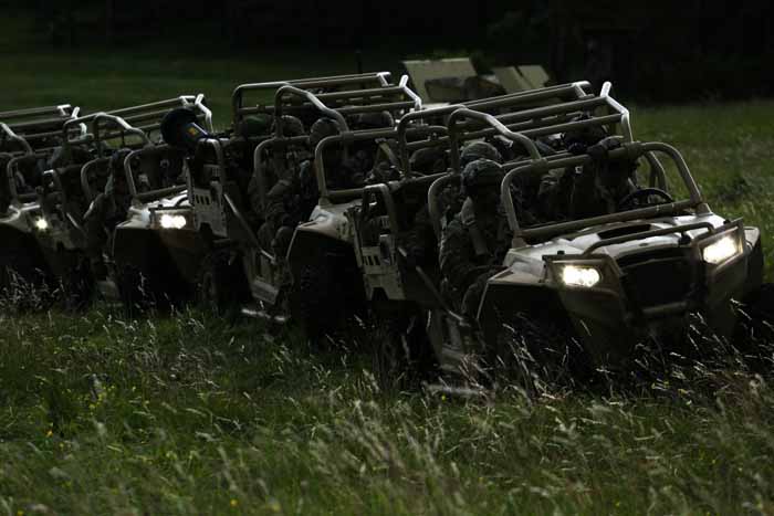  US soldiers of Chaos Company, 504th Parachute Infantry Regiment, 82nd Airborne Division prepare to move out with their Light Tactical All Terrain Vehicles.